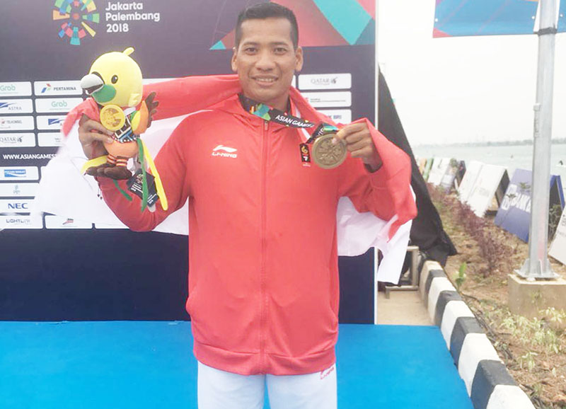 Rio Akbar saat meraih medali di Asian Games 2018 Palembang.